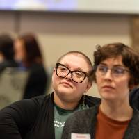 people seated and listening